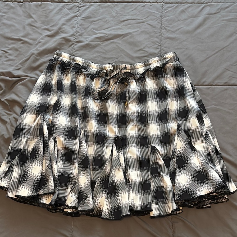 Entro Black and White Mini Skater Skirt with Tie Front and Pleated Design